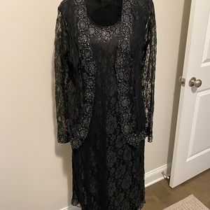 Beautiful black lace sleeveless dress with jacket. Exquisite details.